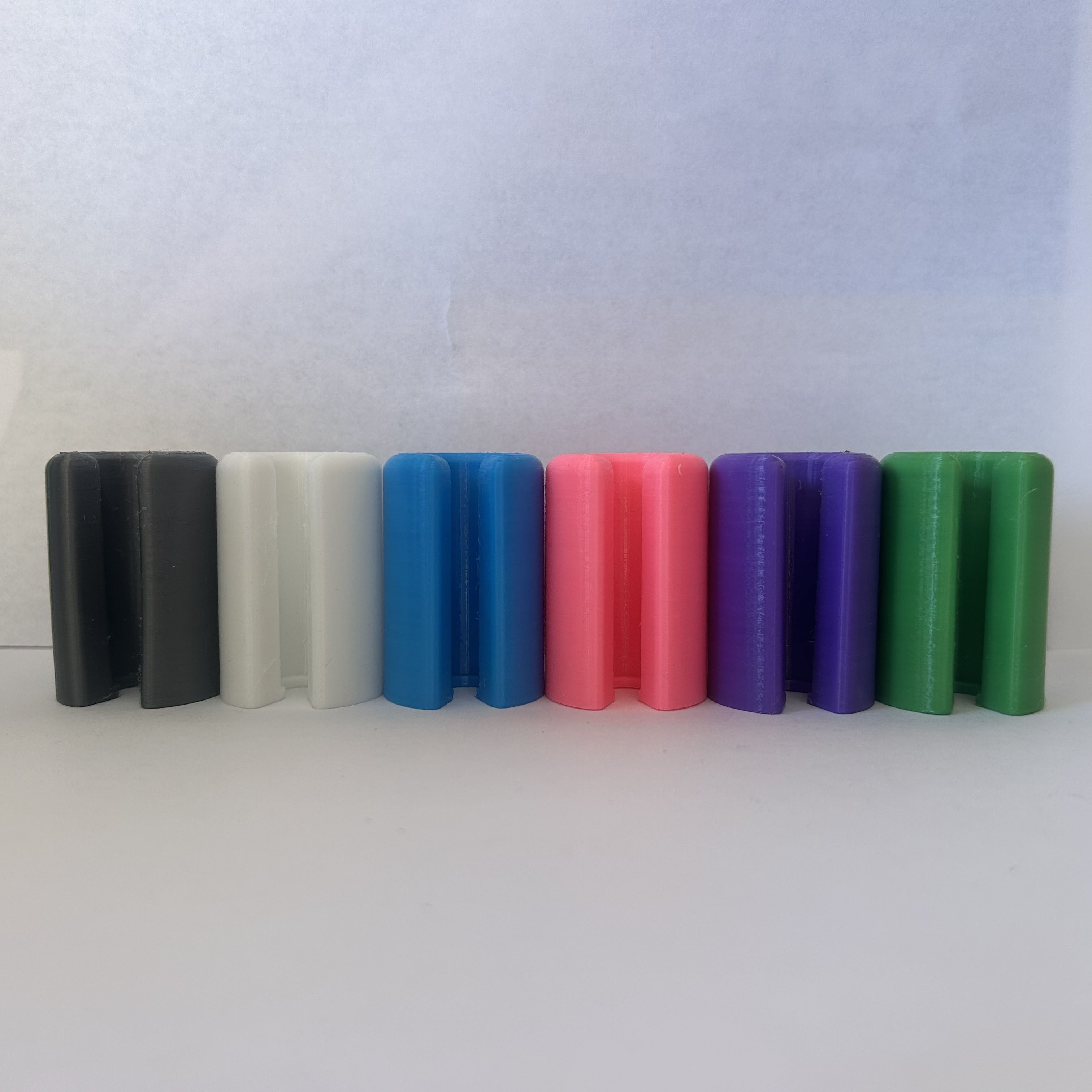 Anywhere Buddy lip balm holders in all six colors